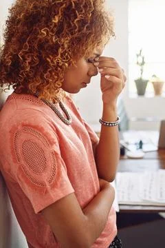 Never let a setback prevent you from a comeback. a businesswoman looking Stock Photos
