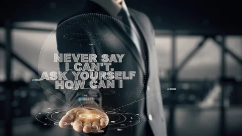 Never say i can't. Ask yourself how can i with hologram businessman concept Stock Footage 91574264