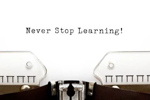 Never stop learning typewriter Stock-Fotos