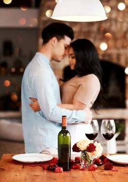 Never stop making dates special. a young couple having a romantic evening at Stock Photos