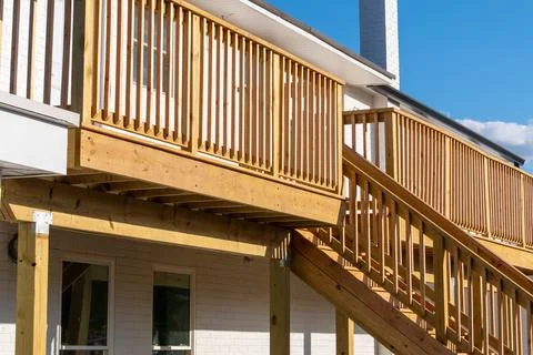 New above ground deck and patio of family home Stock Photos