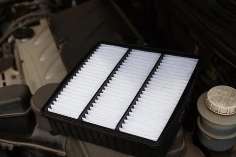 New air filter. Replacement engine air flow filter Stock Photos