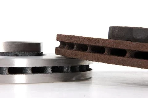 New and old disk brake rotors Stock Photos