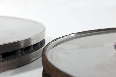 New and old disk brake rotors Stock Photos