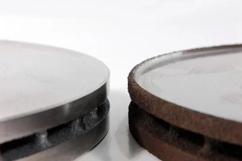 New and old disk brake rotors Stock Photos