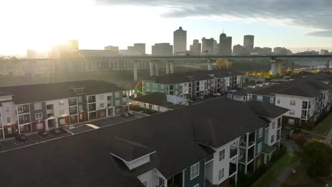 New apartment building complex along river in America. USA housing on Video stock 225646047