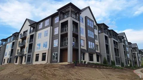 New Apartment Building Complex Under Construction with a Modern Design Fotos Stock