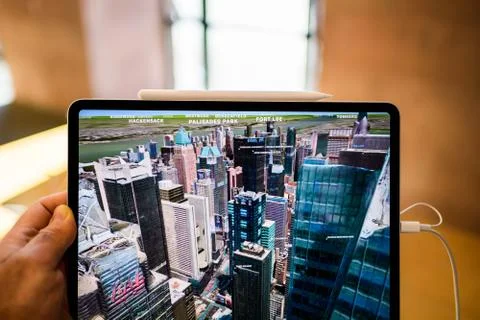 New Apple Computers iPad Pro tablet using flyover New York Stock Photos