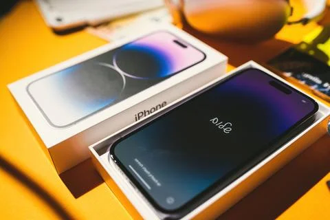 New Apple Computers Setup: MacBook Pro 14 with Hello Message in Unknown Language Stock Photos
