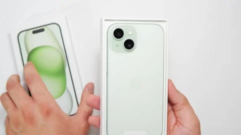 New Apple iPhone 16 unboxing new smartphone produced by Apple Computer, Inc Stock Footage 258731235