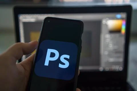 New Artificial intelligence features on Adobe Photoshop on PC and Smarthpone Stock Photos