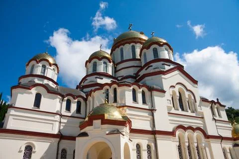 New Athos monastery of St. Simon the Canaanite monastery in the sunshine. New Stock Photos