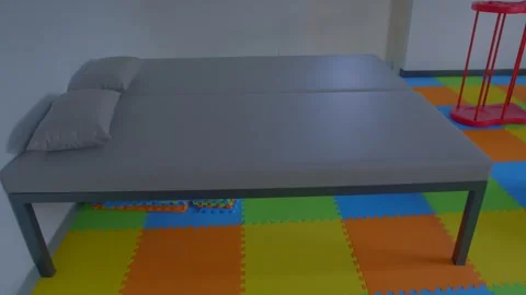 New bed Daycare creche setup without kids Stock Footage 263528172