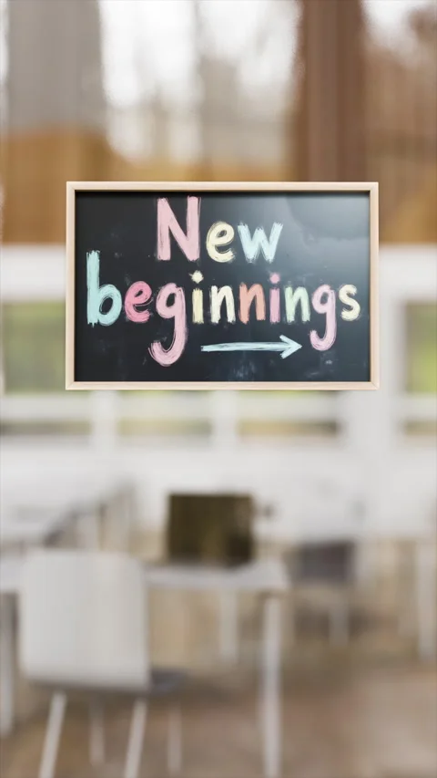 New beginning colorful text written on chalkboard with wooden frame Stock Footage 313360022