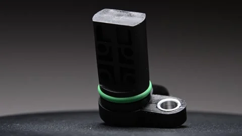New black plastic crankshaft position sensor for an internal combustion engine Stock Footage 328911022
