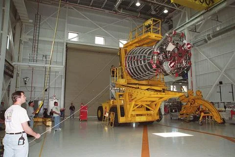 A new block 2 engine is lowered onto a transport vehicle for a move to the... 写真素材