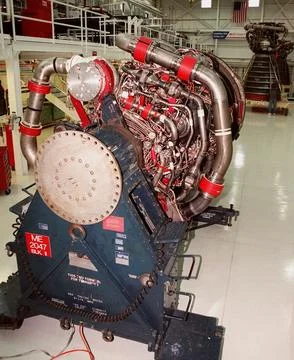 A new Block 2A engine awaits processing in the low bay of the Space Shuttle.. Stock Photos