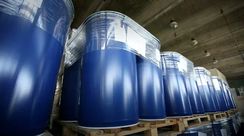 New blue barrels inside a storage warehouse. Camera slider moving. Stock Footage 38613463