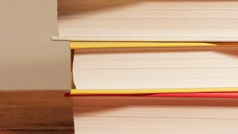 New Books On Stack Standing. Stock Footage 73645288