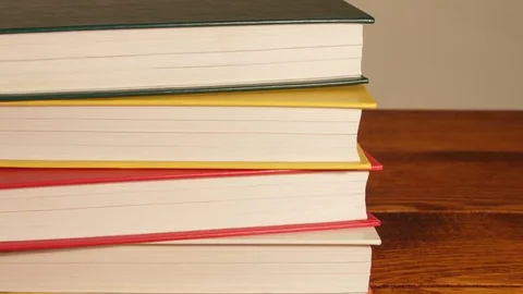 New Books On Stack Standing. Stock Footage 73645738