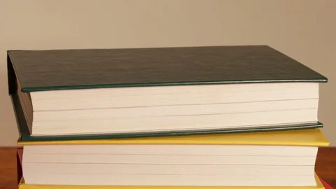New Books On Stack Standing. Stock Footage 73645837