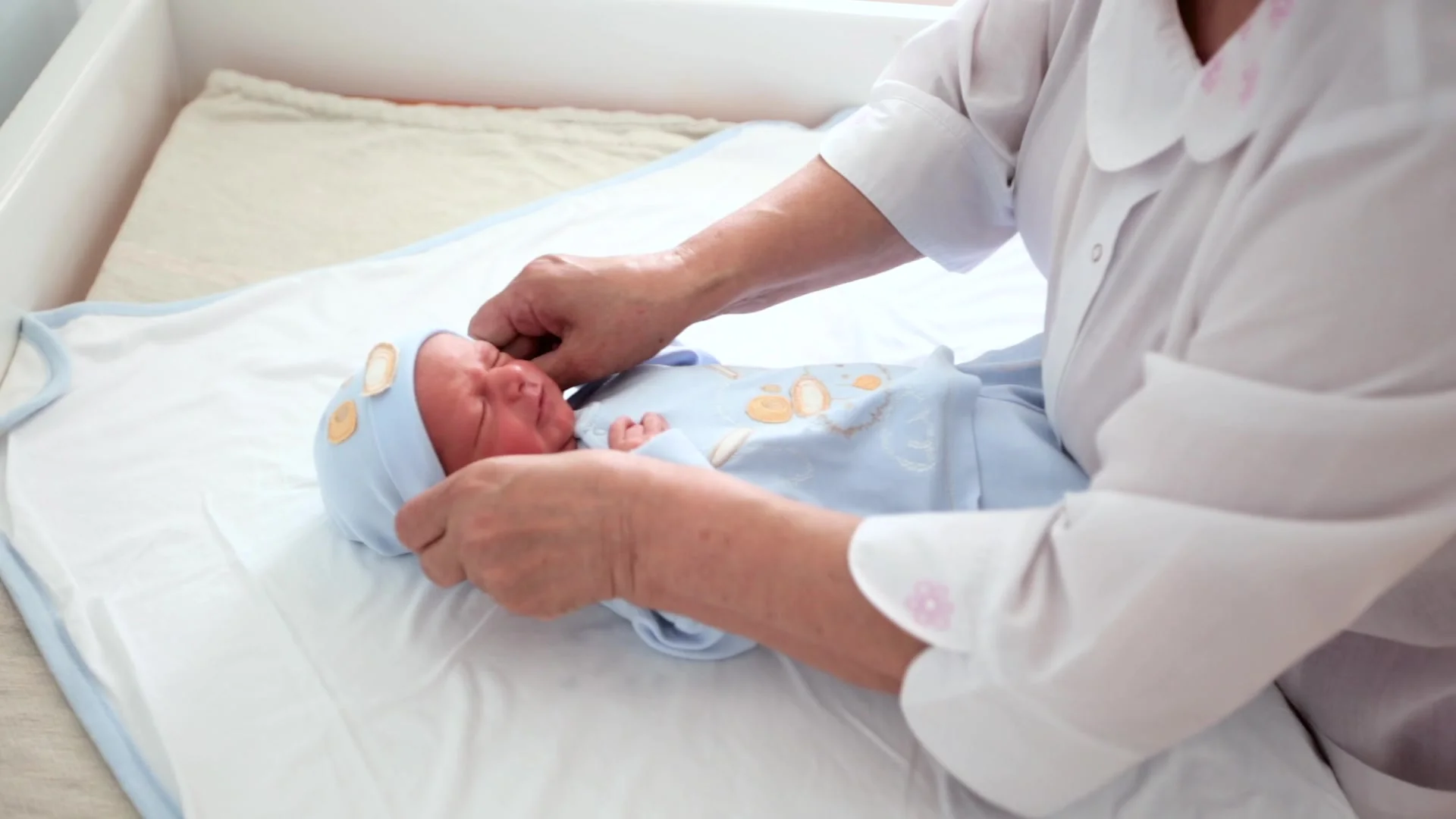 New born baby boy swaddled immediately a, Stock Video