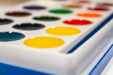 A new box with multi-colored paints for drawing in perspective. 写真素材