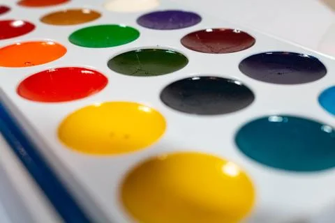 A new box with multi-colored paints for drawing in perspective. Фото