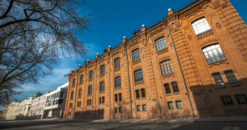 New brick building in the old classic style in the rays of the evening sunset  Stock Footage 119553077