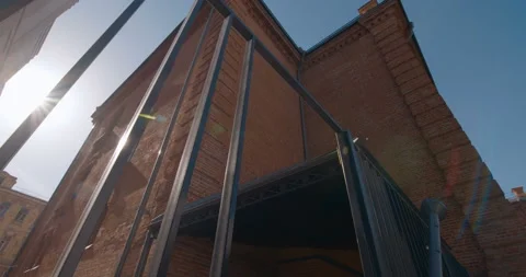 New brick building in the old classic style in the rays of the sun Stock Footage 119556119