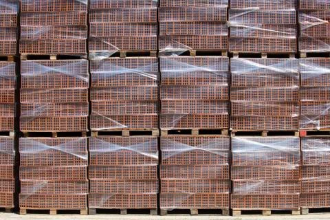 New bricks on stacked pallets Stock Photos