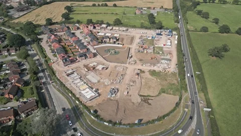 New Build housing development plot of land, Crewe, Cheshire, England, aerial Vídeos de archivo 283358077