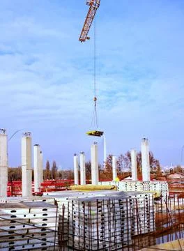 New building is being constructed with use of tower crane Stock Photos