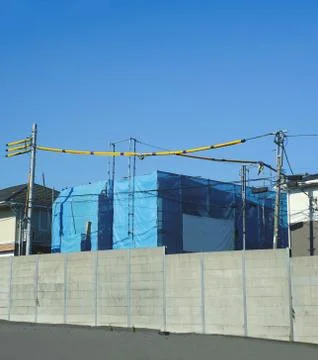 New building under construction on high ground on midday in summer Fotos Stock