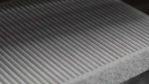 New cabin filter for a car, close-up Stock Footage 279342822