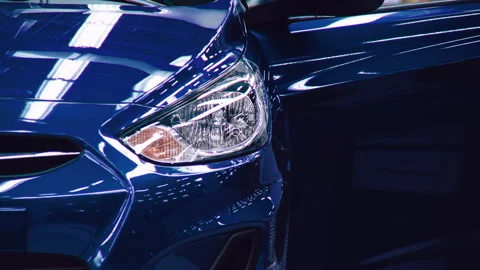 The new car after the last check includes headlights and leaves the production l Stock Footage 92197624