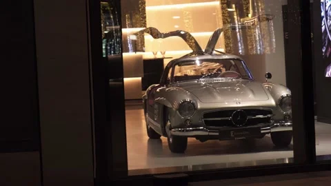 New car behind the window in dubai car salon in dubai Stock Footage 235349832