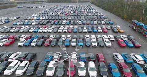 New Car Storage Yard With Hundreds of Vehicles, High Aerial Drone Shot Видео 340300221