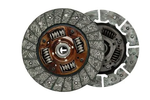 New car transmission clutch disc and used side by side Stock Photos