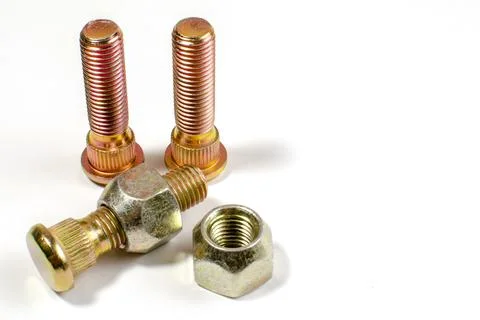 New chrome nuts and studs for repairing different cars Stock Photos