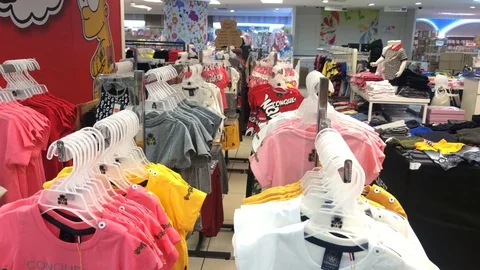New clothes or "Baju Raya" for eid fitri for kid at the store Stock Footage 107889945