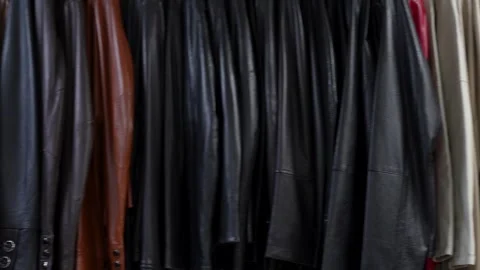 New collection of different color leather jackets for women Stock Footage 271025341