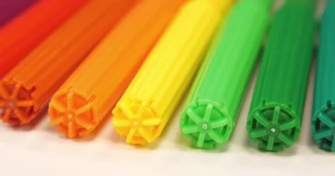 New colored felt-tip pens, arranged of rainbow colors lie on white table Stock-Footage 309103193