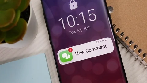 New Comment Notification on a Smartphone Screen Stock Footage 122013984