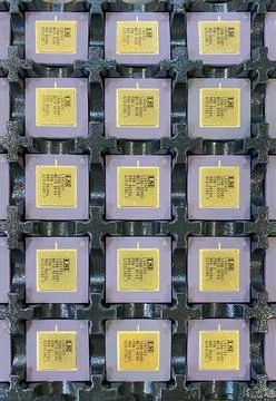 New computer processor chips in a pattern. Stock Photos