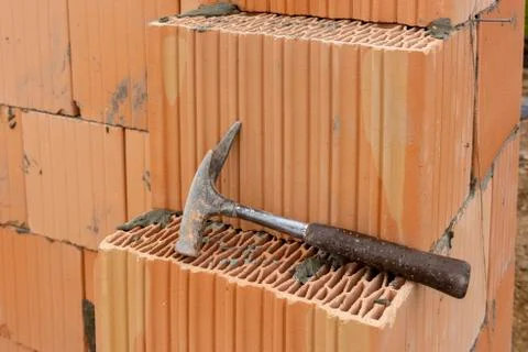 New construction of a house with bricks Stock Photos