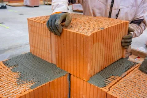 New construction of a house with bricks Stock Photos