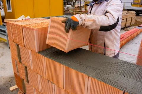 New construction of a house with bricks Stock Photos