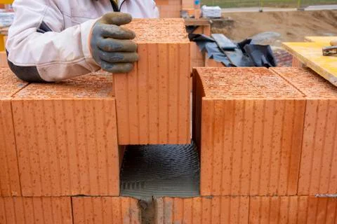 New construction of a house with bricks Stock Photos