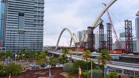 New construction site in Miami, Florida, USA. Multiple transport moves by the Stock Footage 332810466